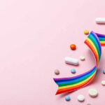 FDA-Approved Pill Blocks Allergy Attacks Colorful pills and a rainbow ribbon on a pink background