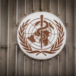 Inside WHO Awards: Truth Behind the Honors World Health Organization emblem featuring a globe and caduceus