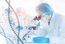 Scientists Discover Cancer’s Achilles’ Heel Scientist examining samples under a microscope in a laboratory