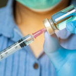 Pediatric Sedation: Hidden Risks You Need to Know Healthcare professional preparing a syringe from a vial