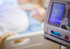 Euthanasia Shock: Uruguay Crosses The Line IV pump displaying medication flow rate in a hospital room