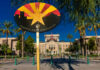 Colorful sign of the Phoenix Pride Commission in front of a government building