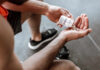 Supplement Trap That KILLS Your Muscle Gains Person pouring probiotic pills into their hand