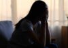 ‘Self-Improvement’ Craze Quietly Wrecks Health A silhouette of a person sitting with their head in their hands, conveying distress