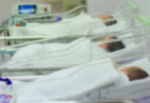 Womb Starvation: Tiny Hearts, Ticking Clock Newborn infants resting in hospital cribs in a nursery