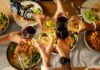 MRI Finds ‘Moderate Drinking’s’ Brain Damage Hands clinking wine glasses over a dinner table