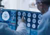 Alzheimer’s Alarm: One Scan, Decade Forecast Doctors reviewing brain MRI scans on multiple monitors