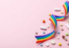 ‘Wrong’ Birth Control Pill, Hidden Cardiac Trap Colorful pills and a rainbow ribbon on a pink background
