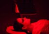 Heating Hair, Releasing Carcinogens Person receiving red light therapy