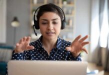 Woman wearing headset on video call