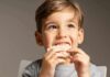 Shocking Deficit Spreading Among Millions Of Kids child eating a rice cake