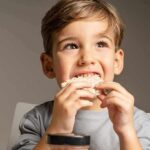 child eating a rice cake