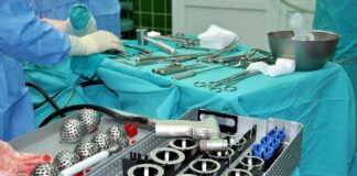 Surgical instruments and implants on a covered operating table