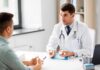 Doctor explaining glucose meters to a patient