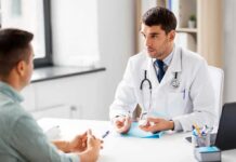 Effect of Blood Sugar Control on Mood Swings Doctor explaining glucose meters to a patient
