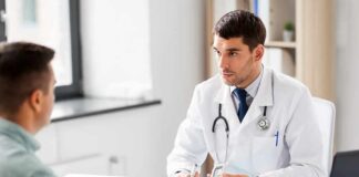 Doctor explaining glucose meters to a patient
