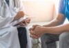 Big Medicine’s New Chronic Pain Playbook Doctor consulting a patient on a sofa