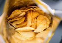 Alzheimer’s Gene + Junk Food = Bad News Ridged potato chips inside an open bag