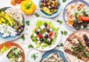 Mediterranean Eating Sparks ‘Longevity’ Proteins Greek meze spread with salad, olives, pita, and grilled skewers