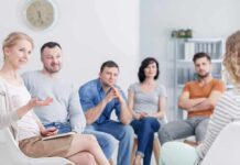 Harvard Guru Exposes Fake Leisure Trap Support group meeting with six adults seated in a circle