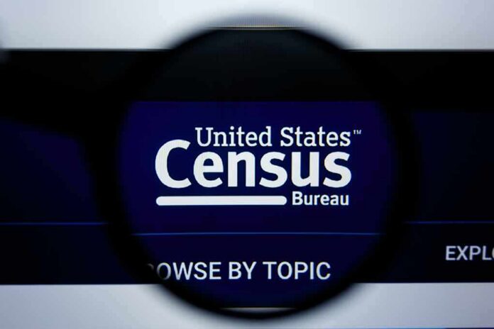 Magnifying glass over United States Census Bureau website