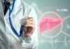 Viral Cholesterol TikTok Myths Exposed Doctor holding a stethoscope with a digital liver graphic