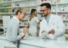 FDA Crackdown Hits Ozempic Copycats Pharmacist assists customer at pharmacy counter