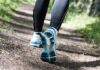 Everybody’s Trail Running Now. Use These Tips to Get Good. Runner's feet in athletic shoes on a forest trail