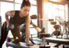 Gymtimidation: Build More Confidence At The Gym Woman performing dumbbell row in a gym