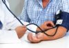Hypertension Hack: The Workout That Lasts Overnight Patient getting blood pressure checked with a cuff and stethoscope